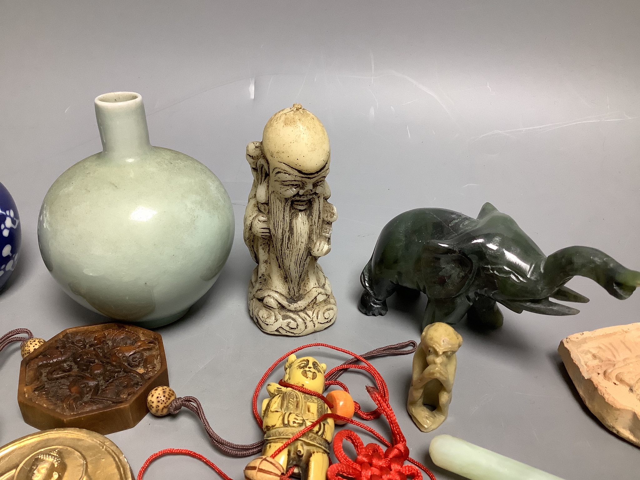 A quantity of assorted Chinese small items, jade mirror etc